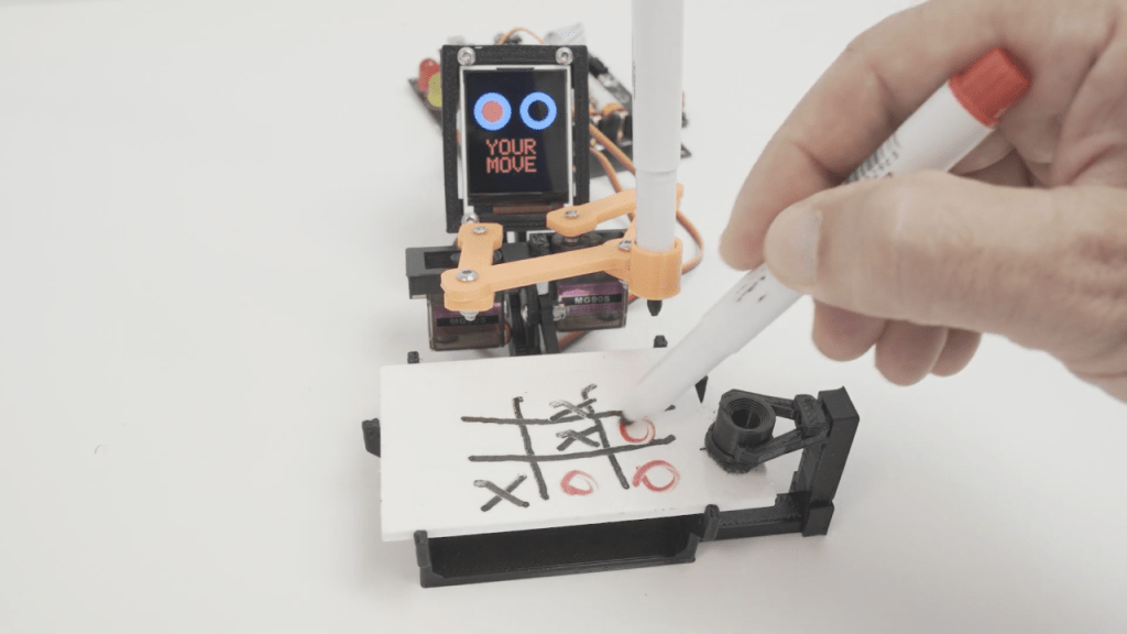 TICO Robot Plays Tic-Tac-Toe By Drawing On A Tiny&nbsp;Whiteboard