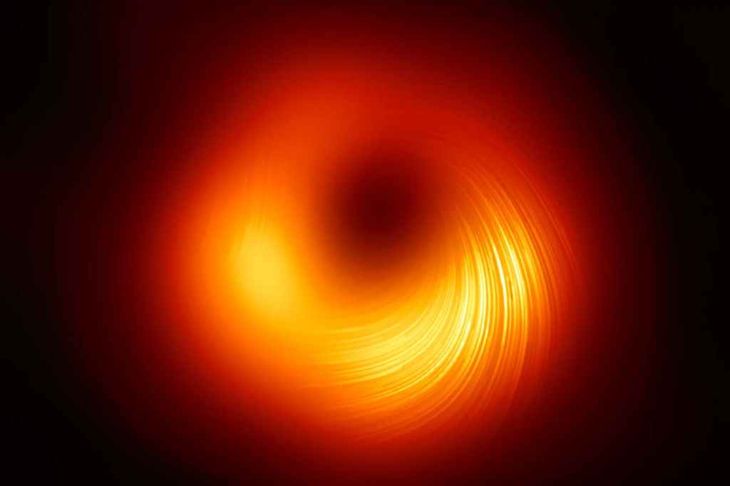 New picture of famous black hole reveals its swirling magnetic&nbsp;field